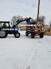 Front loader log grab